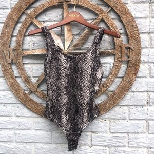 Soft, snake-skin body suit